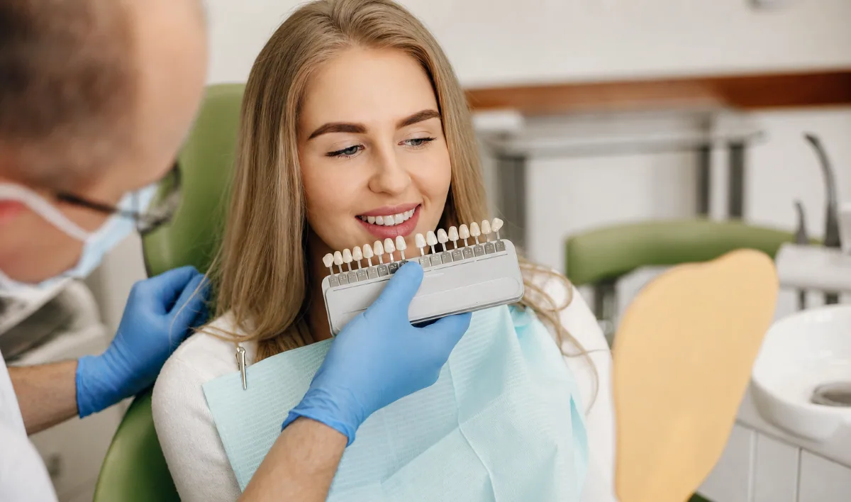 Dental Veneers Consultation North York | Shade Selection at North Toronto Dental Centre Dental veneers consultation in North York — dentist reviewing veneer shade options with a patient
